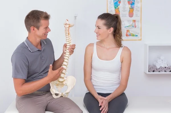 Chiropractor Explaining Spinal Alignment